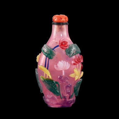View full screen - View 1 of Lot 1003. A six-colour overlay pink glass 'lotus pond' snuff bottle, Qing dynasty, 19th century | 清十九世紀 粉紅地套六色料蓮塘圖鼻煙壺.