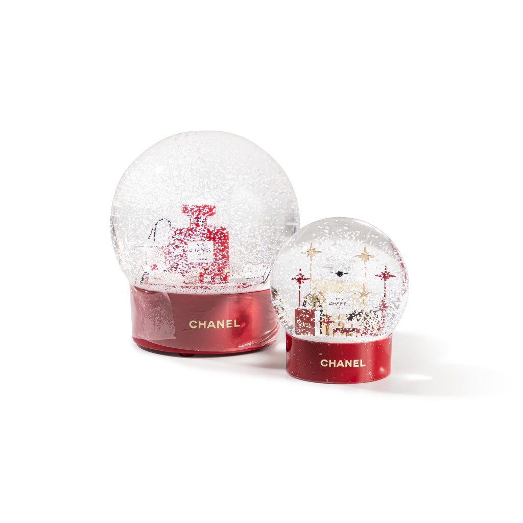 View full screen - View 1 of Lot 527. One XL Red N°5 Perfume Motorized Snow Globe and One Red N°5 Perfume Snow Globe.