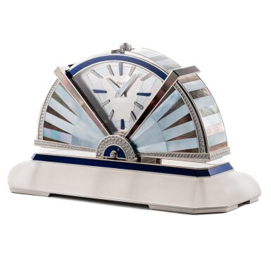 View full screen - View 1 of Lot 44. A white gold, rock crystal, mother-of-pearl, lapis lazuli and diamond-set desk clock with concealed dial, Circa 2000 | 伯爵 白金鑲白水晶、珠母貝、青金石及鑽石座鐘配隱藏錶盤,約2000年製.