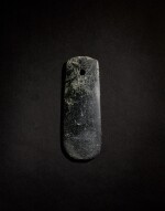 An archaic jade ceremonial axe, Neolithic period