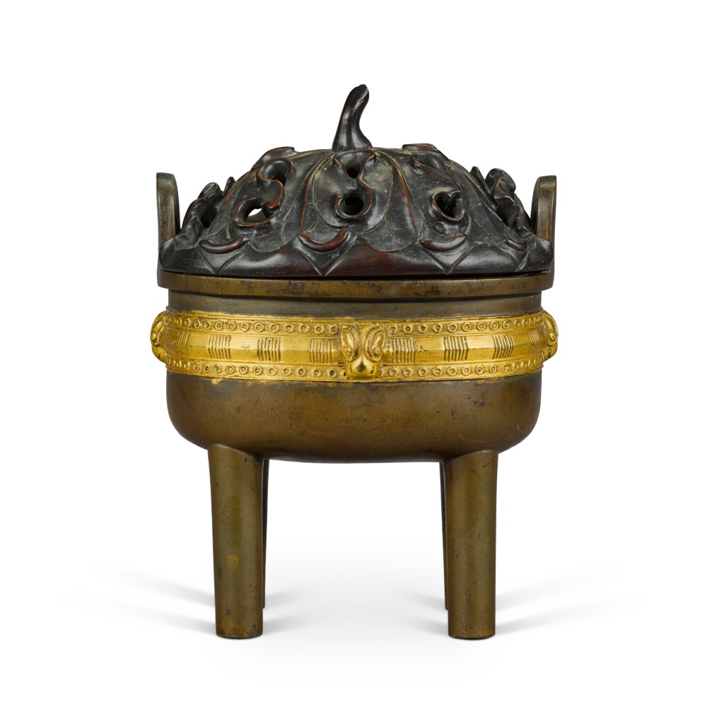 View full screen - View 1 of Lot 120. A parcel-gilt bronze censer, Qing dynasty, 18th century | 清十八世紀 局部鎏金銅雙耳爐 《大明宣德年製》仿款.