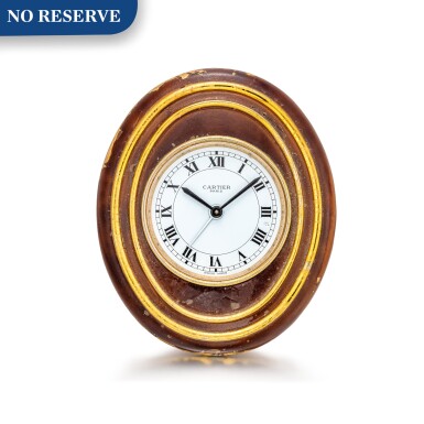 View full screen - View 1 of Lot 8059. CARTIER | REFERENCE 7511 | A GILT BRASS AND ENAMEL ALARM CLOCK WITH 8 DAYS POWER RESERVE, CIRCA 1980 | 卡地亞 | 型號7511 鍍金銅製及琺琅鬧鐘,備8天動力儲備顯示,約1980年製.