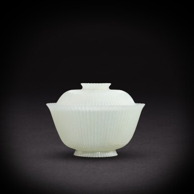 View full screen - View 1 of Lot 6924. A white jade Mughal-style cup and cover, Qing dynasty, 19th century | 清十九世紀 白玉痕都斯坦式菊瓣紋蓋碗.