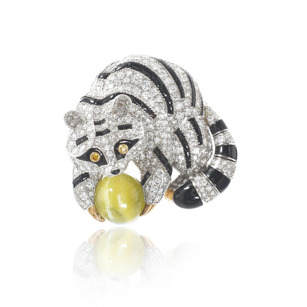 View full screen - View 1 of Lot 617. Cat's eye chrysoberyl, onyx and diamond brooch, 'Ricky', circa 1991.