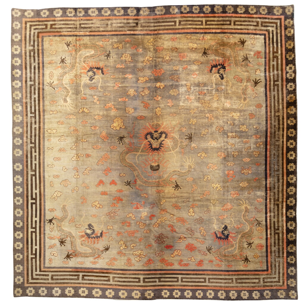 View full screen - View 1 of Lot 132. An impressive probably Ningxia yellow-ground 'dragon' hall carpet, Qing dynasty, 17th - 18th century | 清十七至十八世紀 或寧夏 黃地五龍紋地毯.