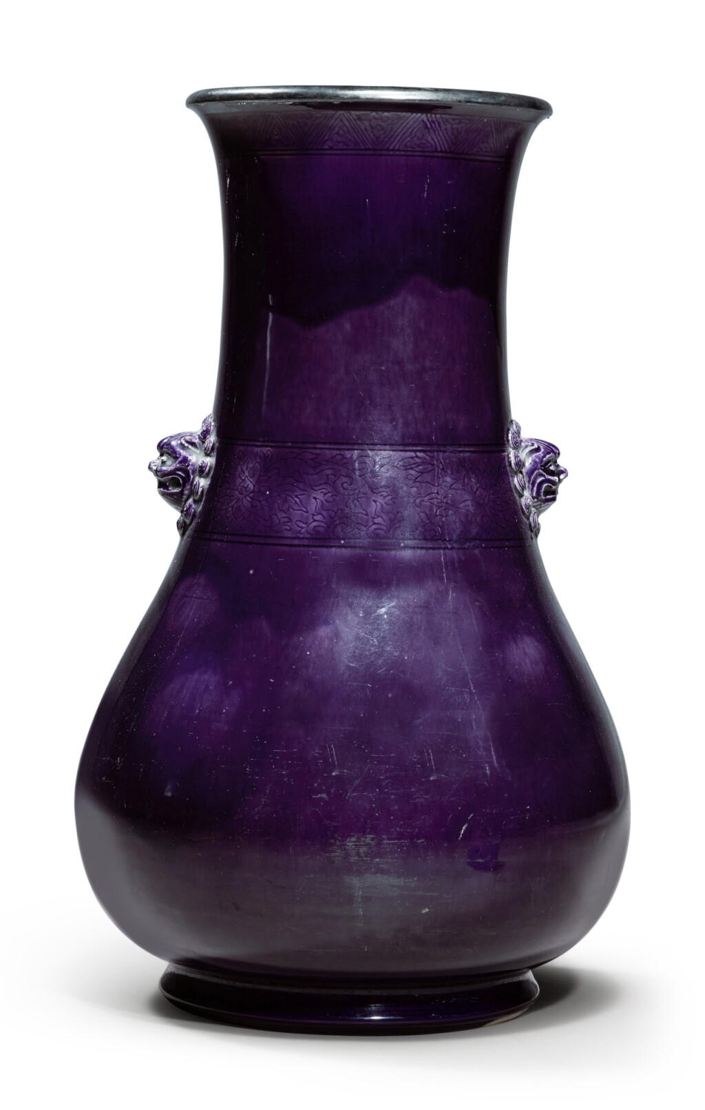 View full screen - View 1 of Lot 114. A large aubergine-glazed hu-form vase with mask-form mock-handles, Qing dynasty, Kangxi period.