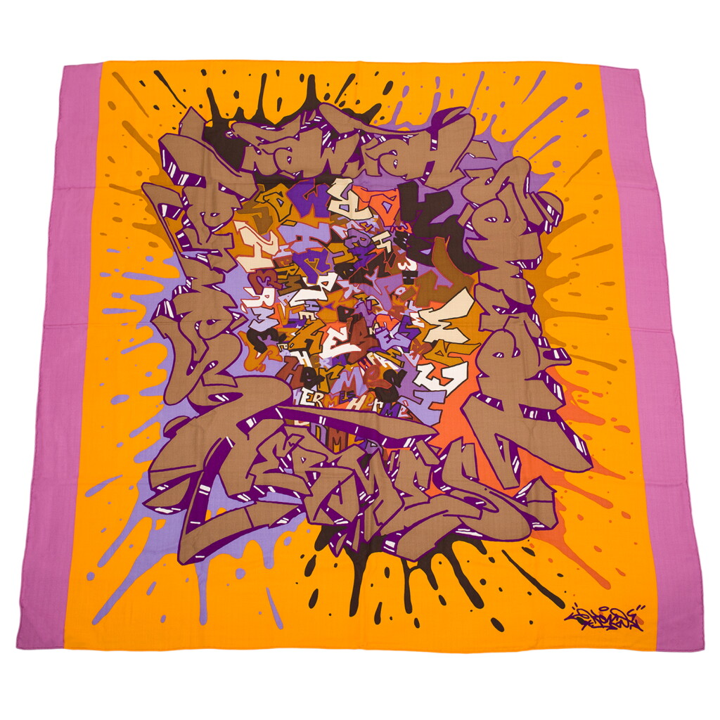 View full screen - View 1 of Lot 126. HERMÈS | "GRAFF" (GRAFFITI) CASHMERE AND SILK SHAWL SCARF 140CM.