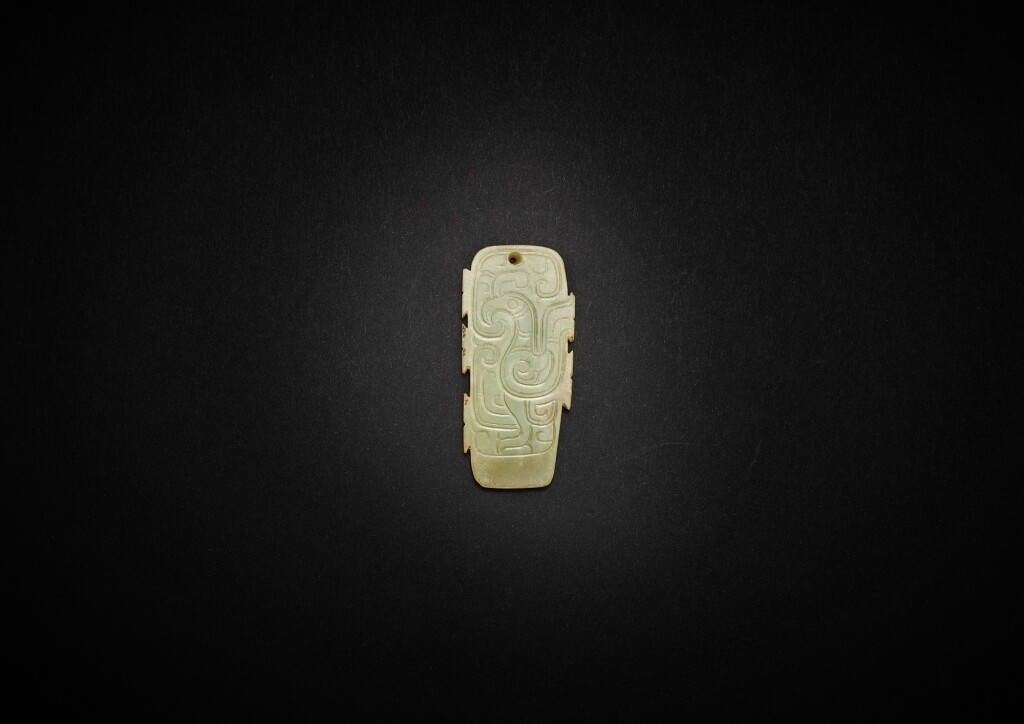 View full screen - View 1 of Lot 3788. An archaic celadon jade 'bird' handle, Mid-Western Zhou dynasty | 西周中期 青白玉鳥紋柄形飾.