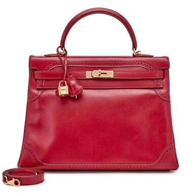 View full screen - View 1 of Lot 92. Limited Edition Rubis Tadelakt Ghillies Kelly Retourne 32 Permabrass Hardware, 2012.