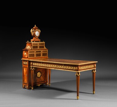 View full screen - View 1 of Lot 13. A late Louis XV gilt-bronze mounted tulipwood and amaranth bureau plat with its cartonnier and its clock, circa 1766-1770, stamped by Philippe-Claude Montigny .