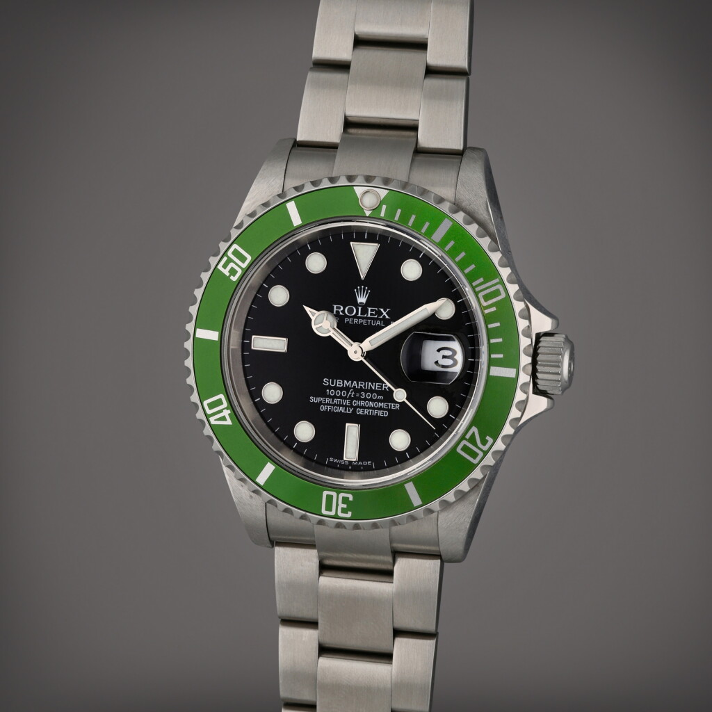 View full screen - View 1 of Lot 252. Reference 16610T Submariner 'Kermit' | A stainless steel automatic wristwatch with date and bracelet, Circa 2005.