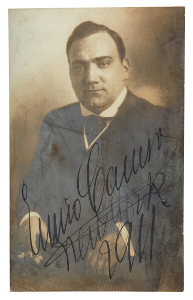 View full screen - View 1 of Lot 28. E. Caruso. Postcard photograph of the singer, signed and inscribed, 1911.