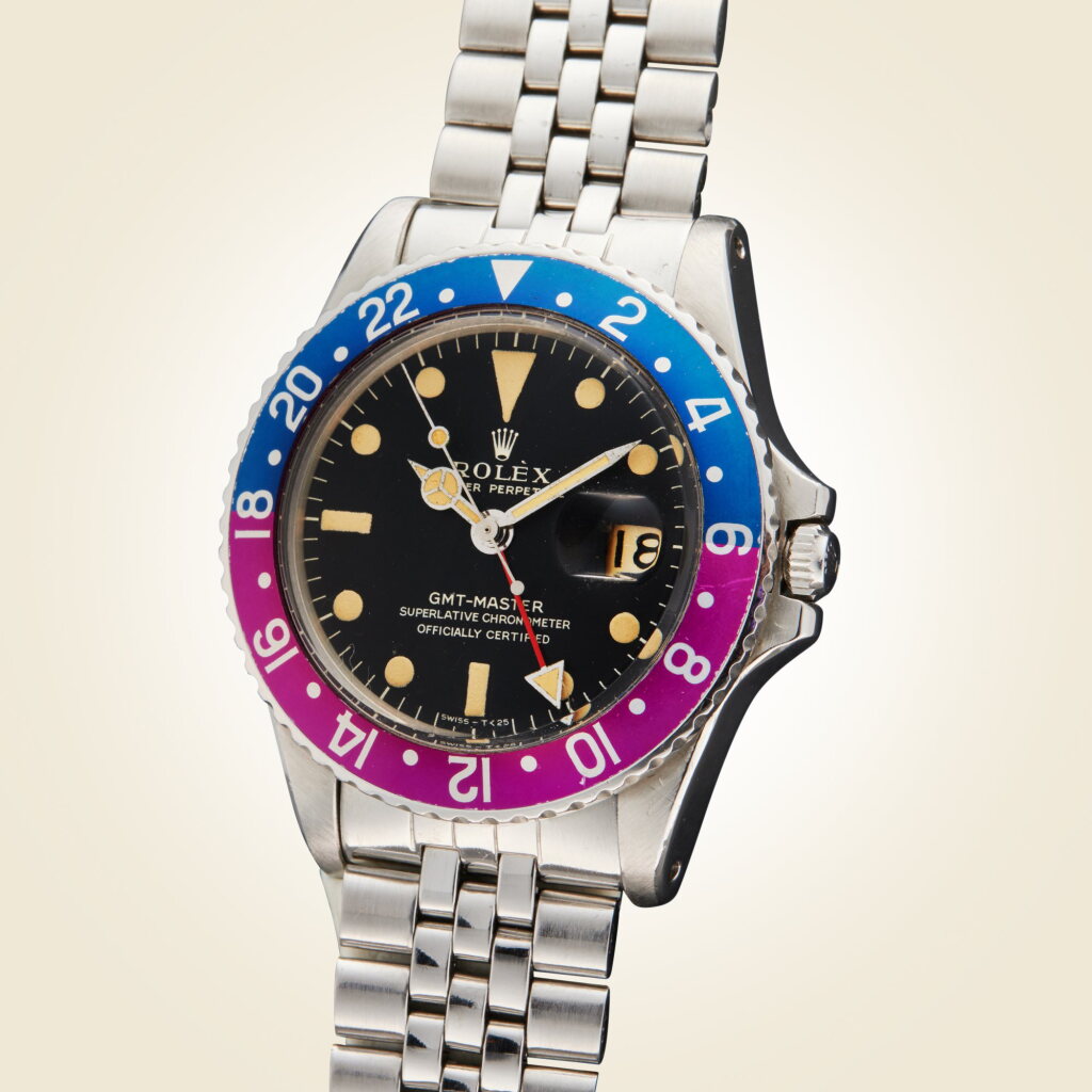 View full screen - View 1 of Lot 352. Reference 1675 GMT-Master 'Fuchsia' | A stainless steel automatic dual time zone wristwatch with date and bracelet, Circa 1968.