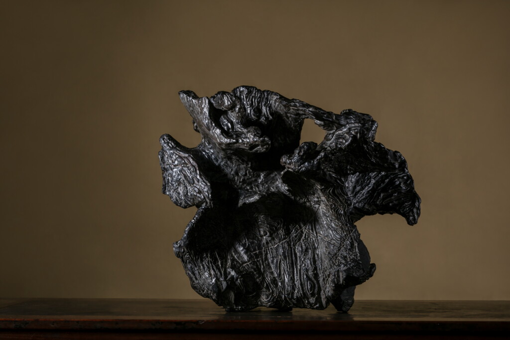 View full screen - View 1 of Lot 1519. Mythical Lingzhi A black Lingbi scholar’s rock, Northern Song dynasty, inscribed by Mi Fu | 北宋 米芾銘玄芝岫 靈璧石.