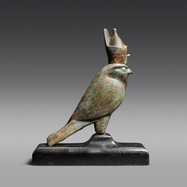 View full screen - View 1 of Lot 12. An Egyptian Bronze Figure of the Horus Falcon, 26th Dynasty, 664-525 B.C..
