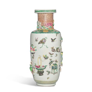 View full screen - View 1 of Lot 426. A relief-decorated famille-rose 'Auspicious Emblems' rouleau vase, Qing dynasty, 19th century | 清十九世紀 粉彩貼花吉祥紋棒槌瓶.
