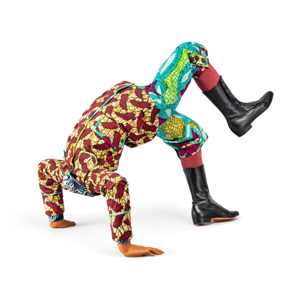 View full screen - View 1 of Lot 88. Boy Doing Headstand.