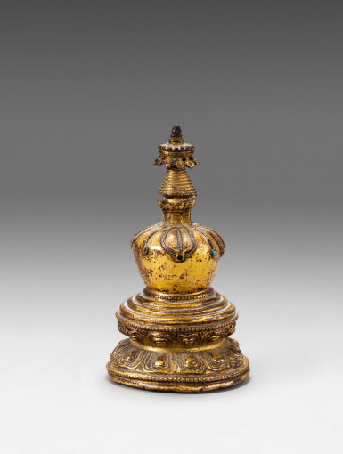 View full screen - View 1 of Lot 111. A gilt-copper stupa Tibet, 15th century | 西藏 十五世紀 鎏金銅佛塔.