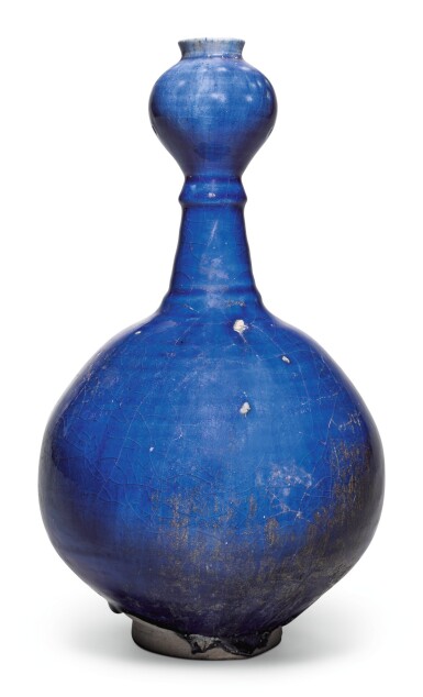 View full screen - View 1 of Lot 213. AN INTACT KASHAN BLUE-GLAZED BOTTLE VASE, PERSIA, 12TH/13TH CENTURY.