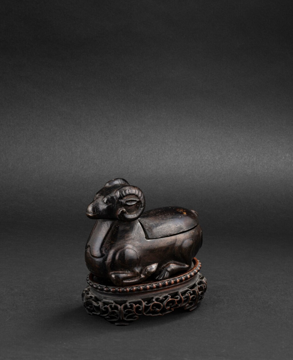 View full screen - View 1 of Lot 167. Statuette en bronze de bélier formant lampe à huile Dynastie Ming ou antérieure | 明或更早期 銅臥羊燈 | A 'ram' bronze oil lamp, Ming Dynasty or earlier.