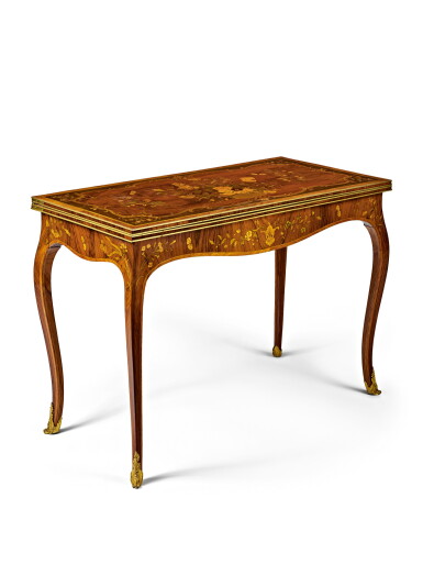 View full screen - View 1 of Lot 54. A Russian Rococo Fruitwood and Tulipwood Marquetry Games Table, Circa 1770.