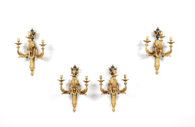 View full screen - View 1 of Lot 152. A set of four patinated and gilt-bronze wall appliques, French Restauration | Suite de quatre appliques en bronze patiné et doré d'époque Restauration.