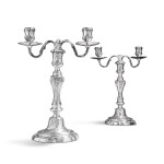 A pair of silver candlesticks and a pair of silver two-light branches, the candlesticks Nicolas Belhomme, Saint-Mihiel, circa 1760, the branches Louis Gaspard Thevenot, Paris, 1755-1756 | Paire de flambeaux et paire de branches à deux lumières en argent, les flambeaux par Nicolas Belhomme, Saint-Mihiel, vers 1760, les branches par Louis Gaspard Thevenot, Paris, 1755-1756