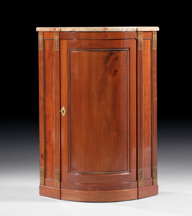 View full screen - View 1 of Lot 55. A large mahogany corner cabinet, Louis XVI, circa 1780 | Grande encoignure en acajou flammé d'époque Louis XVI, vers 1780.