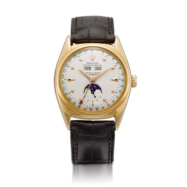 View full screen - View 1 of Lot 2293. Reference 6062 | A pink gold triple calendar wristwatch with moon phases, Circa 1955 | 勞力士 | 型號6062 | 粉紅金全日曆腕錶,備月相顯示,約1955年製.