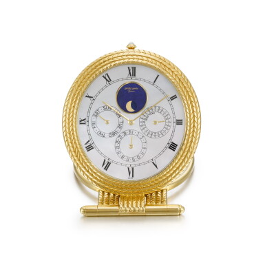 View full screen - View 1 of Lot 82. Yellow Gold Perpetual Calendar Desk Timepiece With Mother-Of-Pearl Dial And Moon-Phases, Circa 1990.