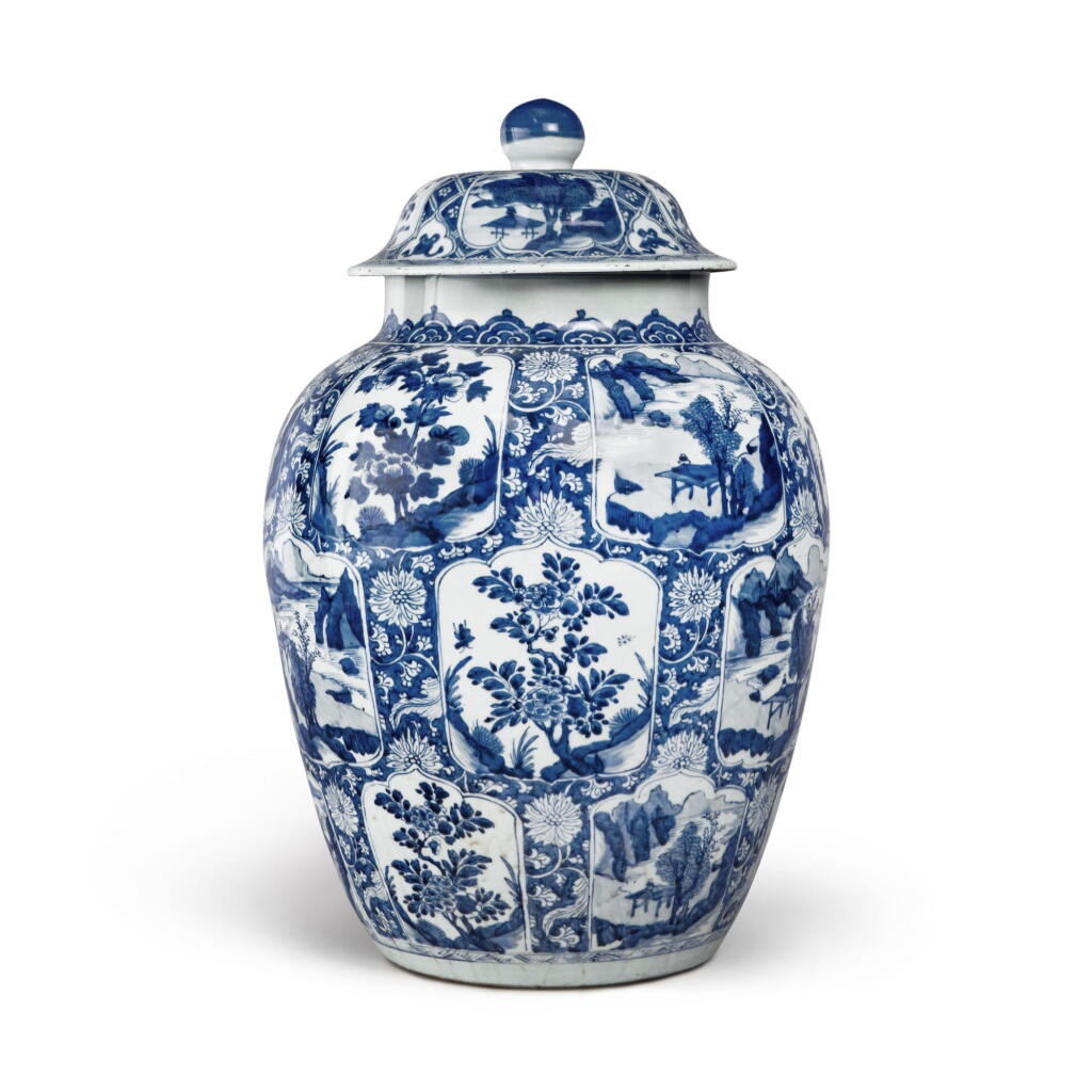 View full screen - View 1 of Lot 938. A large blue and white 'landscape' baluster jar and cover, Qing dynasty, Kangxi period | 清康熙 青花開光山水花卉圖大蓋罐.