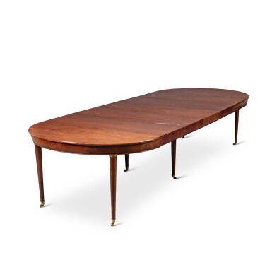 View full screen - View 1 of Lot 27. A Directoire gilt-bronze mounted mahogany extending dining table, circa 1790.