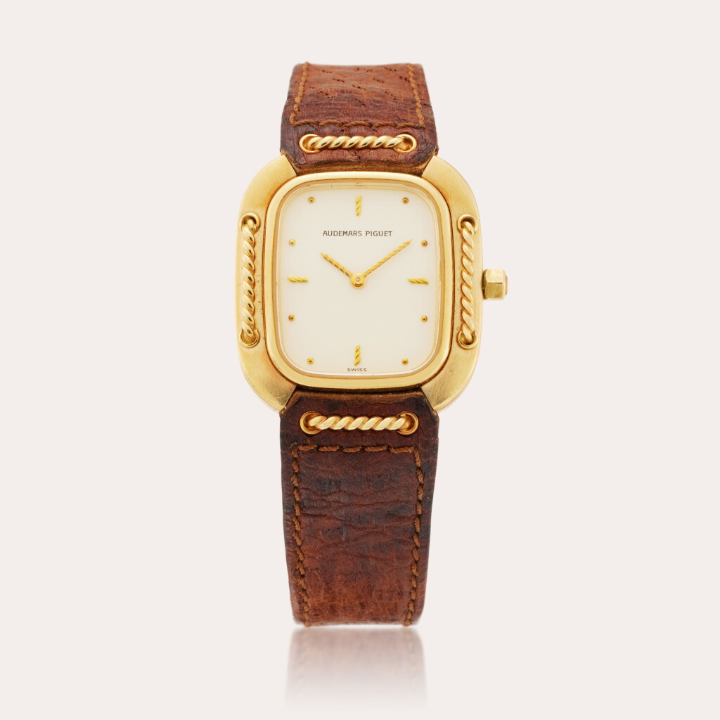 View full screen - View 1 of Lot 77. Reference 6051BA Cord'Or | Retailed by Fred Joaillier: A rare yellow gold wristwatch with gold cord detail, Circa 1983.