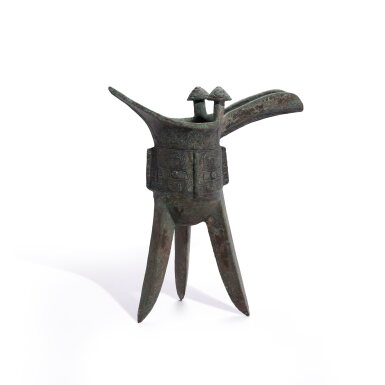 View full screen - View 1 of Lot 715. An inscribed bronze ritual wine vessel, jue, Late Shang dynasty | 商晚期 青銅天爵.
