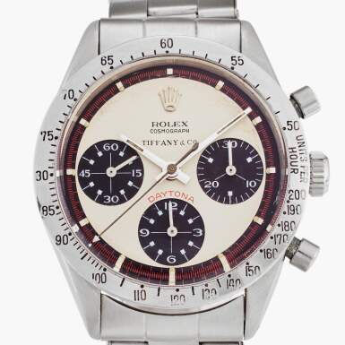 View full screen - View 1 of Lot 207. Reference 6239 'Paul Newman' Daytona | Retailed by Tiffany & Co.: A stainless steel chronograph wristwatch with bracelet, Circa 1967.