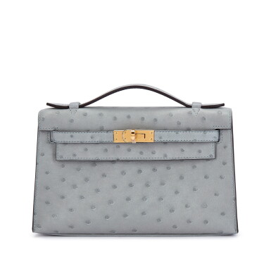 View full screen - View 1 of Lot 6118. Bleu Glacier Ostrich Kelly Pochette Gold Hardware, 2024.