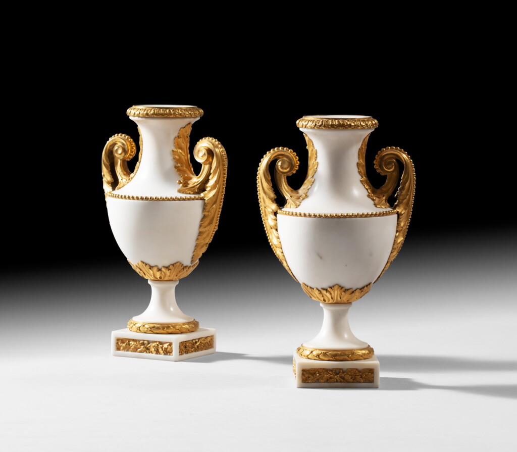 View full screen - View 1 of Lot 113. A pair of Louis XVI gilt-bronze-mounted white marble vases | Paire de vases en marbre blanc et bronze doré d'époque Louis XVI.