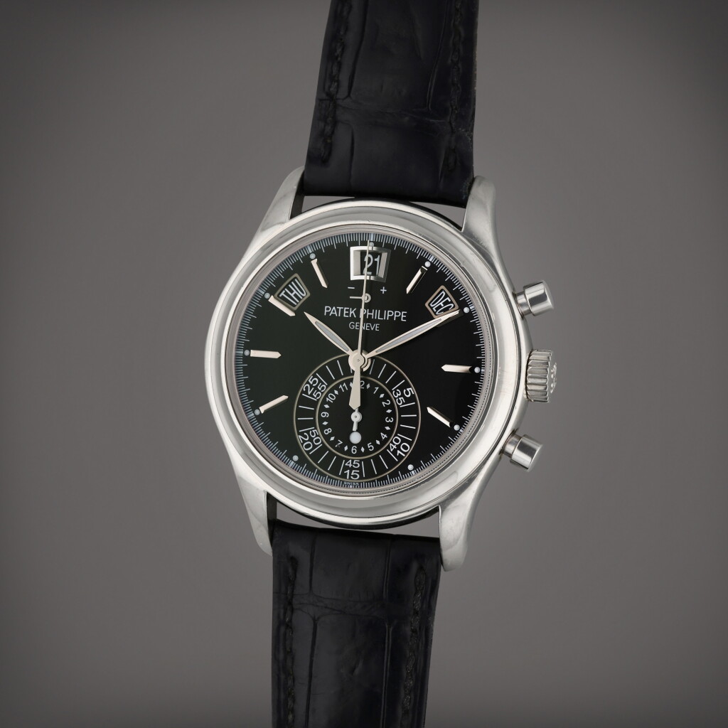 View full screen - View 1 of Lot 23. Reference 5960P-016 | A platinum automatic annual calendar flyback chronograph wristwatch with power reserve and day/night indication, Circa 2013.