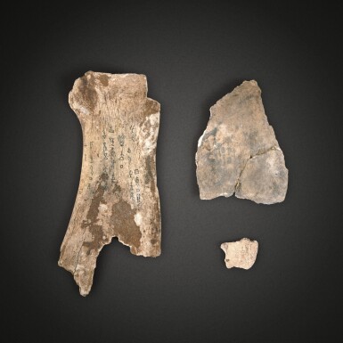 View full screen - View 1 of Lot 503. A group of three oracle bones with inscriptions, Late Shang dynasty | 商末 甲骨刻辭一組三片.