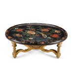 A Continental carved giltwood and lacquered oval sofa table, 19th/20th century