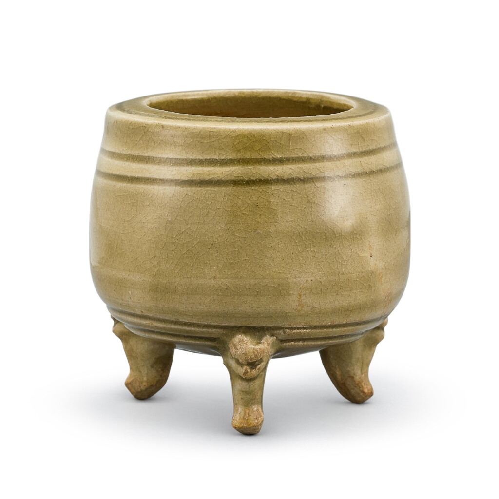 View full screen - View 1 of Lot 465. A Yaozhou celadon tripod censer Jin dynasty | 金 耀州窰青釉三獸足爐.