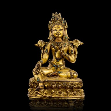 View full screen - View 1 of Lot 107. A gilt copper alloy figure of Green Tara Tibet, 14th - 15th century | 十四至十五世紀 西藏鎏金銅綠度母坐像.