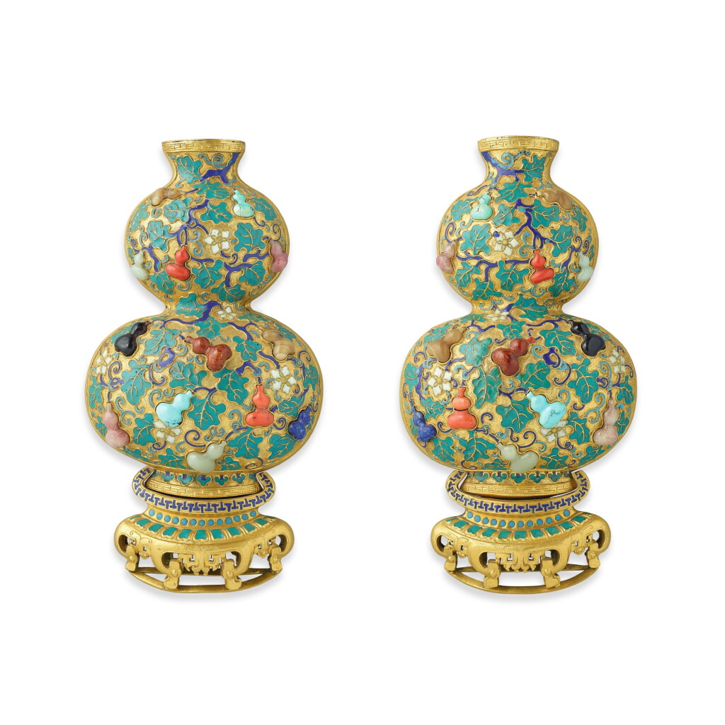 View full screen - View 1 of Lot 185. A rare pair of 'Imperial Tribute' champlevé enamel and hardstone-inlaid double-gourd wall vases, Qing dynasty, Qianlong period.