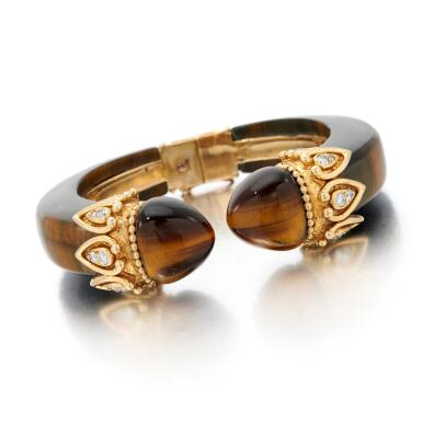 View full screen - View 1 of Lot 117. Tiger's eye and diamond bangle (Braccialetto occhio di tigre e diamanti).