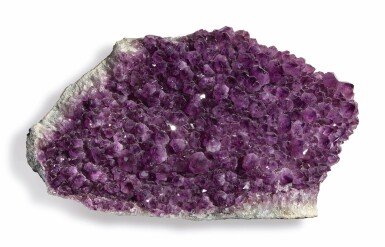 View full screen - View 1 of Lot 86. AN AMETHYST GEODE SECTION.