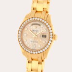 Day-Date Pearlmaster, Reference 18948 | A yellow gold and diamond-set wristwatch with day, date, bracelet and mother-of-pearl and diamond-set dial | Circa 2001