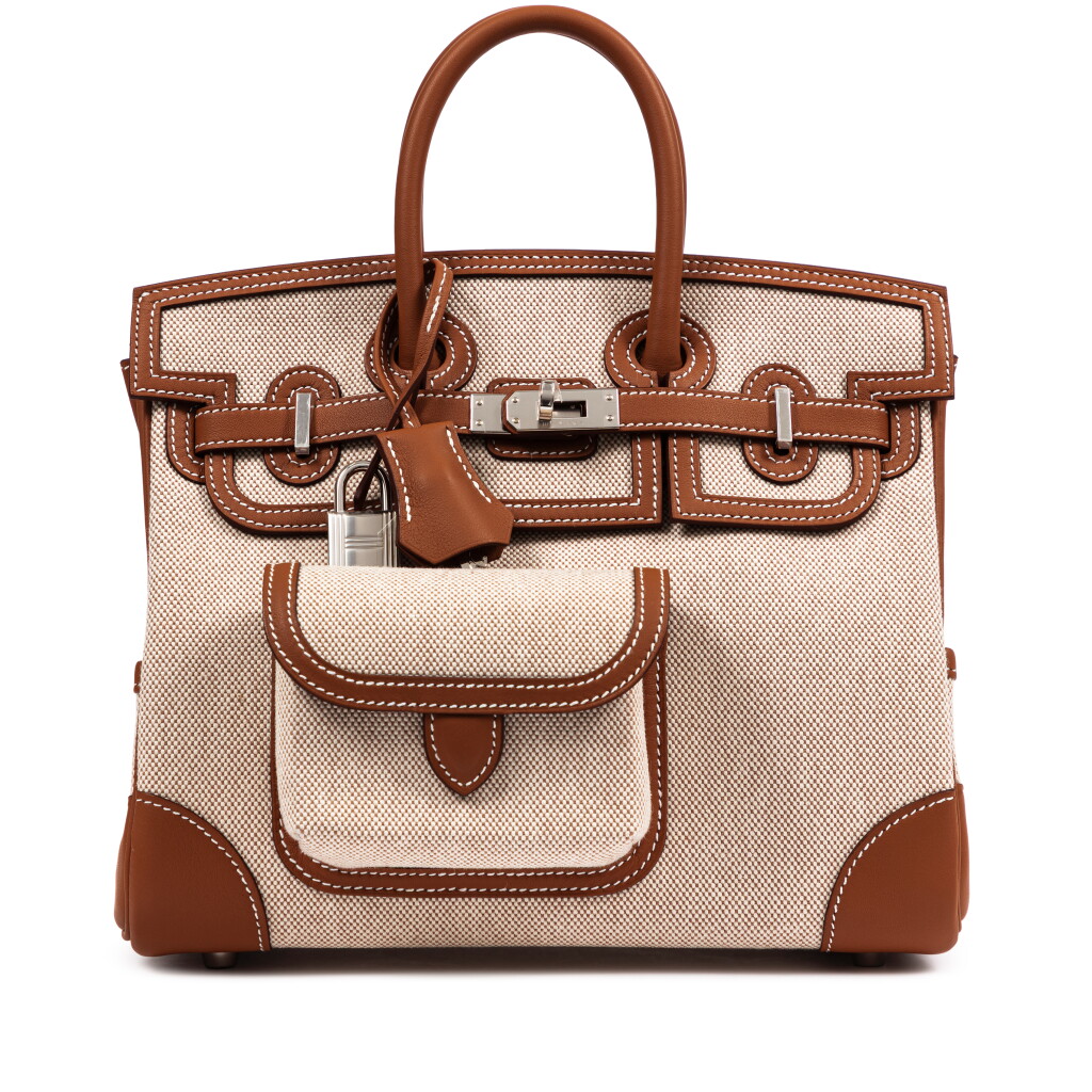 View full screen - View 1 of Lot 650. Limited Edition Gold Swift and Beige Ecru Canvas Cargo Birkin 25 Palladium Hardware, 2026.