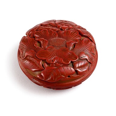 View full screen - View 1 of Lot 3662. A cinnabar lacquer 'camellia' circular box and cover Ming dynasty, Xuande mark | 明 剔紅茶花印盒 《宣德年製》款.