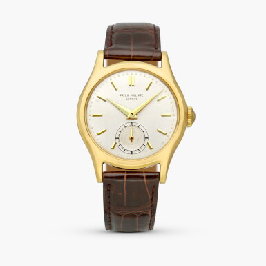 View full screen - View 1 of Lot 2363. Calatrava, Reference 565 | A yellow gold wristwatch, Made in 1951.