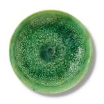 A molded green-glazed dish, Liao dynasty | 遼 綠釉印花盤